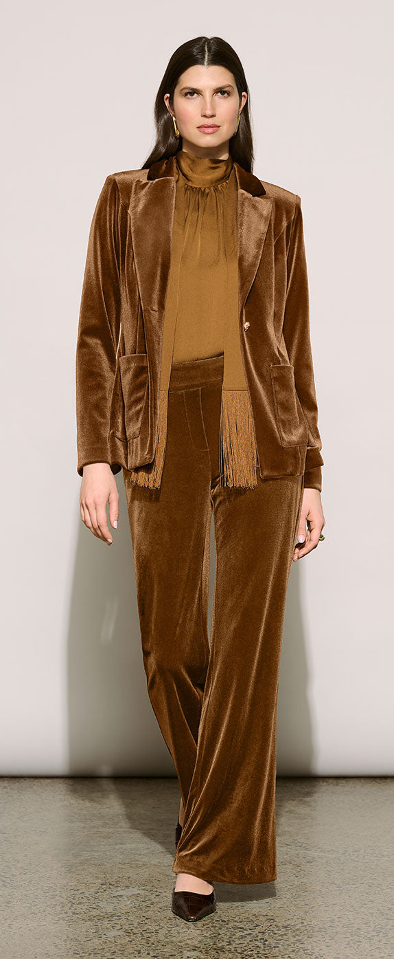 A model wearing Joseph Ribkoff Edit 57 matching brown velvet three-piece suit, including a jacket, a high-neck turtleneck top, and wide-leg trousers